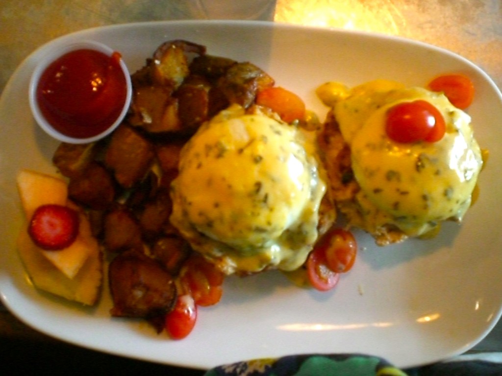 Crab Cake Eggs Benedict on a biscuit with potatoes!